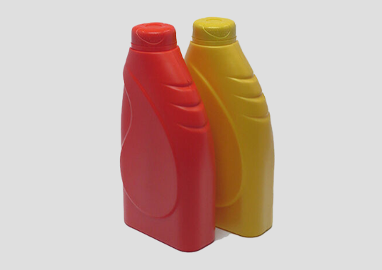 Blow molded oil bottle